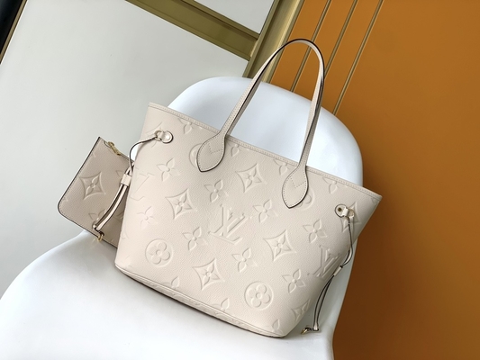 Preloved brannte Monogramm-Segeltuch Neverfull Millimeter beige Tote Bag ein