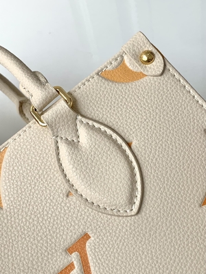 Sahnesafran-riesiges Monogramm OnTheGo Millimeter Louis Vuitton Messenger Bag For Ipad Mini