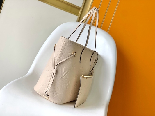 Preloved brannte Monogramm-Segeltuch Neverfull Millimeter beige Tote Bag ein