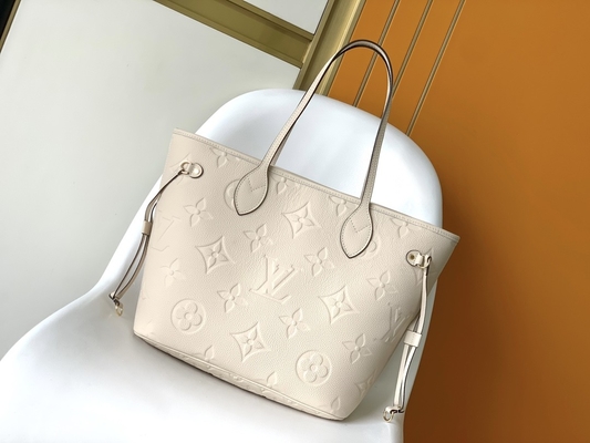 Preloved brannte Monogramm-Segeltuch Neverfull Millimeter beige Tote Bag ein