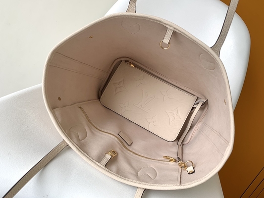 Preloved brannte Monogramm-Segeltuch Neverfull Millimeter beige Tote Bag ein
