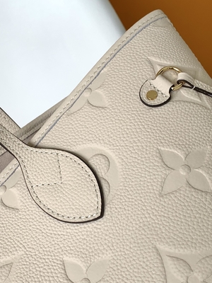 Preloved brannte Monogramm-Segeltuch Neverfull Millimeter beige Tote Bag ein