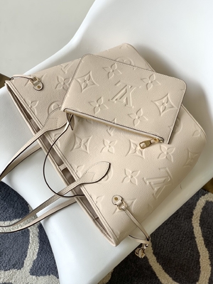Preloved brannte Monogramm-Segeltuch Neverfull Millimeter beige Tote Bag ein